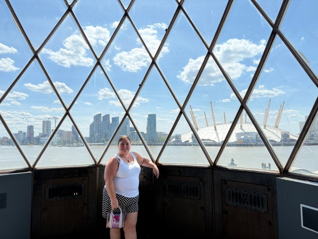 Life of a Crazy Mum standing in the top of a lighthouse overlooking the Thames and The O2 arena.